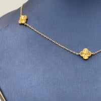 عقد تصميم عالمي ذهب عيار 21