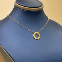 عقد تصميم عالمي ذهب عيار 21