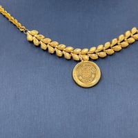 عقد جنيهات ذهب عيار 21