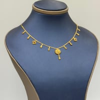 عقد ياسمينة جابر ذهب عيار 21