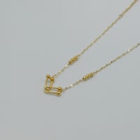 عقد تصميم عالمي ذهب عيار 18