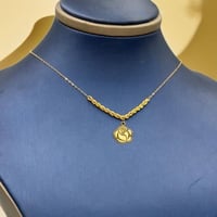 عقد وردة ذهب عيار 21