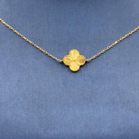 عقد تصميم عالمي ذهب عيار 21