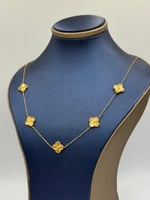 عقد تصميم عالمي ذهب عيار 21