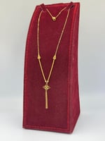 عقد تصميم عالمي ذهب عيار 21