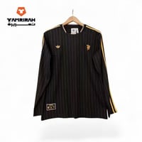 قميص مانشستر يونايتد الكلاسيكي الأسود 2026 كم طويل