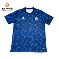 تيشيرت ريال مدريد الأزرق بتصميم مميز نسخة 2026