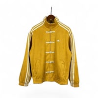 جاكت اديداس نسخة السنة الصينية الجديدة