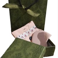 مشط قوتشي الخشبي