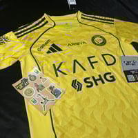 تيشيرت النصر الأساسي 25-26