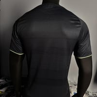 تيشيرت ريال مدريد الأسود 2025/26