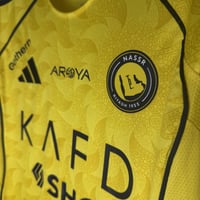 تيشيرت النصر الأساسي 25-26