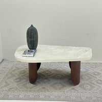 طاولة قهوة سطح بديل حجر ملمس خشن قاعده حديد لون بن...