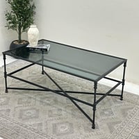 طاولة قهوة سطح زجاج شفاف قاعده حديد لون اسود