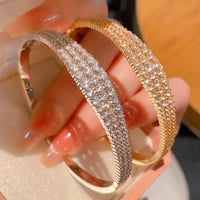 سوار مطلية بالذهب والزركون