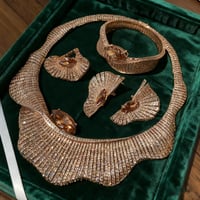 طقم مخنق قلادة القرطذهب عيار 18 قيراط/مطلي بالذهب...