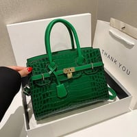 حقيبة كتف نسائية من الجلد اللامع انيقة