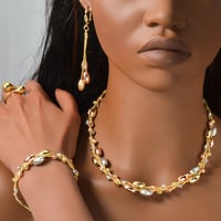 طقم ذهب 3 قطع تصميم عصري انيق