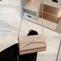 حقيبة صغيرة لامعة بسلسلة