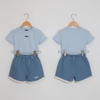 طقم مكون من قطعتين ( بنات ) قصير جديد