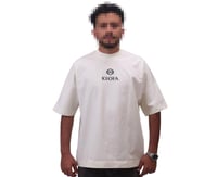 تيشرت اوفر سايز قطني سكري سادة بتطريز لوقو قدام