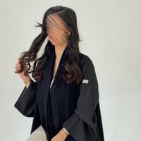 ملكي مع اكمام جاكار اسود