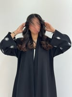 كتان مطرز شمس أبيض