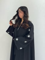 كتان مطرز شمس أبيض