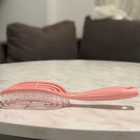 فرشاة الشعر لـ فك التشابك