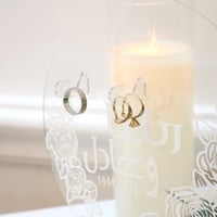 استاند لتقديم دبل العرسان