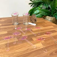 اعواد تحريك السكر بعبارة ( 10 قطع )