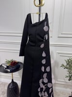 فستان سهرة بأكمام وورد ليزر انيق