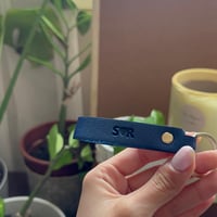 ميدالية مفاتيح حلقه ذهبية