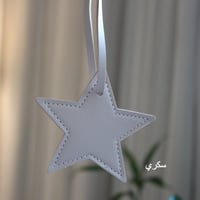 تعليقة جلد شكل نجمه