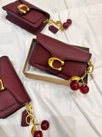 كوتش تابي ميني مقاس 20 مع ميدالية كرز