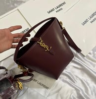 سان لوران مع ميدالية كرز