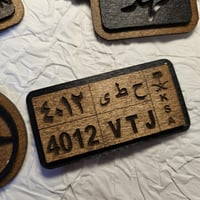 ميدالية أو تعليقة خشبية(لوحة سيارة )