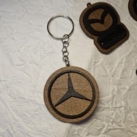 ميدالية أو تعليقة خشبية(لوحة سيارة )