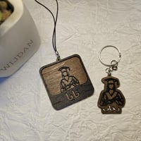 ميدالية مفاتيح أو تعليقة تخرج