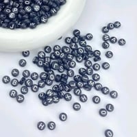 « خرز أسود بحروف انجليزية »