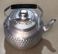 بريق شاهي منقوش كابي