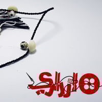 تركيبات عظم من ازراري لاناقة الثوب السعودي