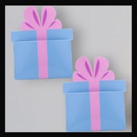 توزيعات العيدية على شكل علبة هدية (الحبة)