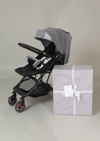 عربية اطفال أنيقه من اللون الرماردي