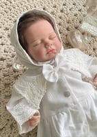 لبس مواليد أوف وايت بتصميم فيونكة