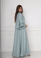 فستان استقبال تركوازي بأكمام طبقات