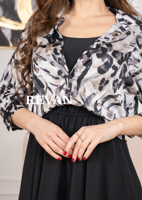 فستان بتصميم راقٍ لإطلالة أنيقة