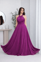 فستان سهرة بستايل هالتر وانسيابية ناعمة