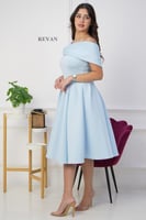 فستان بكسرات أنيقة وتصميم ملوكي