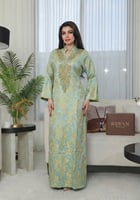 جلابية رمضانية مطرزة بنقوش ذهبية فاخرة من ريڤــان